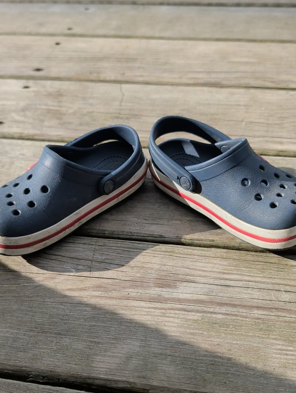 CROCS Kids Navy Clogs with Red Accents